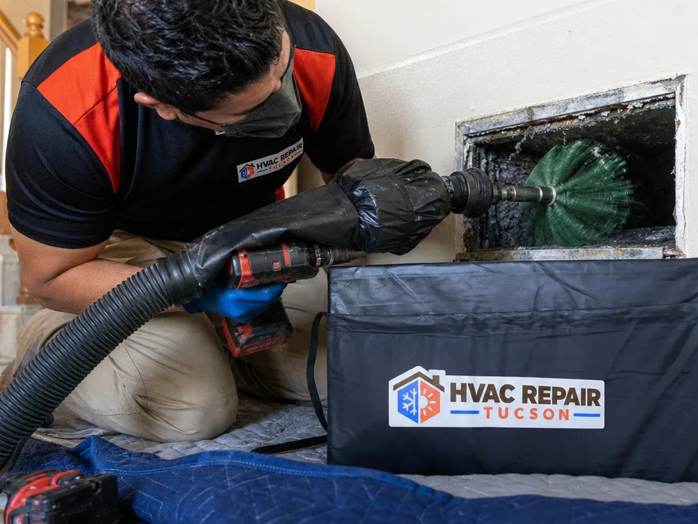 Rotary brush and sealed vacuum hose used for controlled air duct cleaning